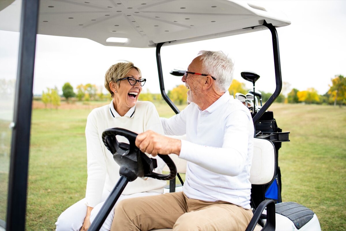 Senior couple reviewing Medicare Advantage plan information at home
