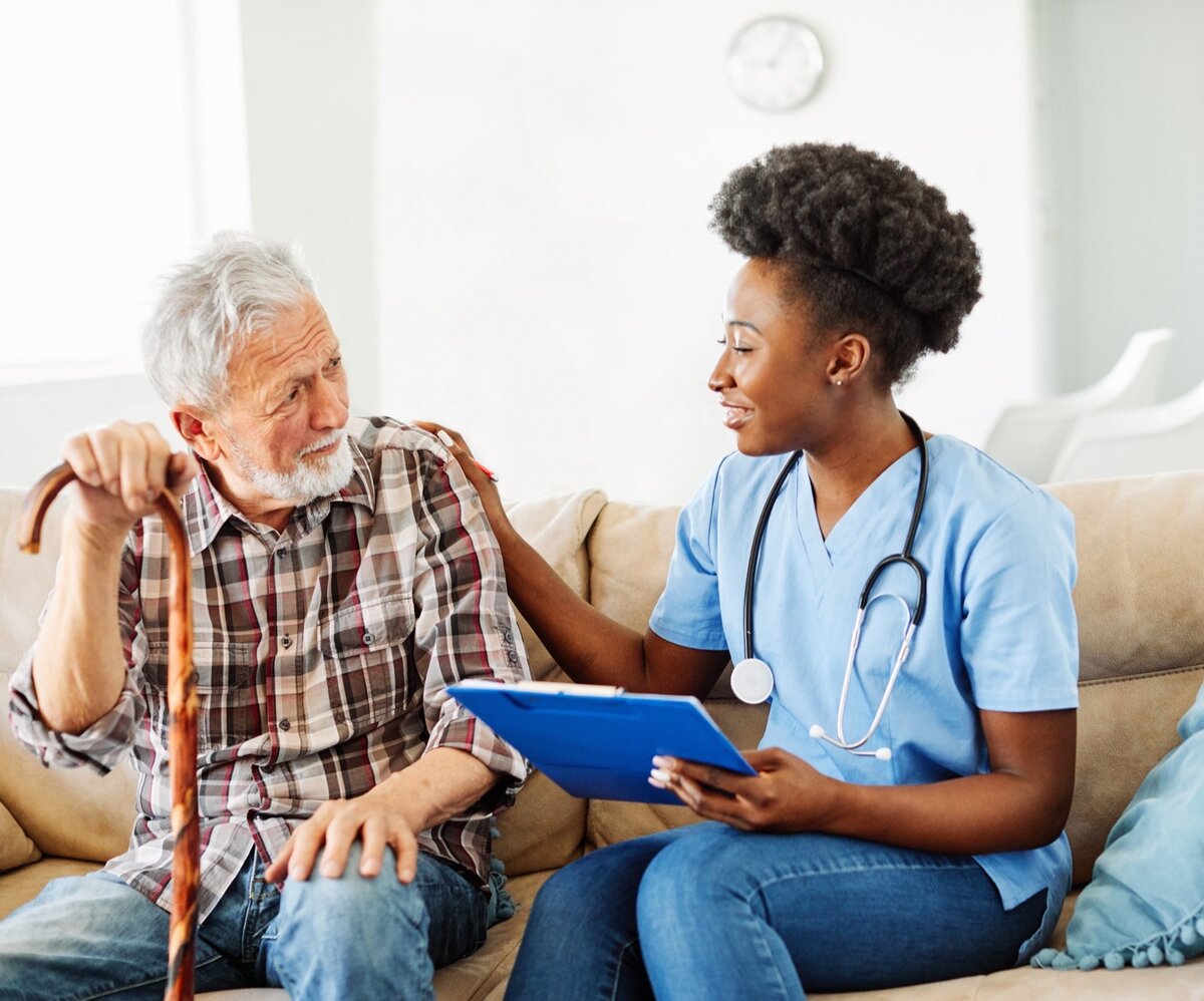 Caregiver helping senior with Special Needs Plan Medicare enrollment